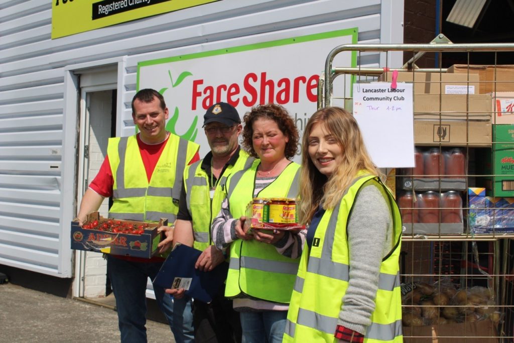 Volunteers from Lancaster Community Club collecting surplus food at FareShare Lancashire and Cumbria 
